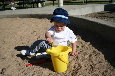 Alex in the sandbox at the park