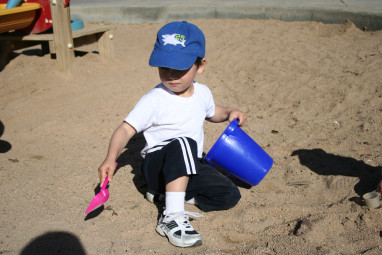 Evan in the sandbox at the park