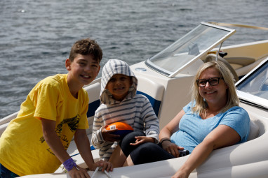 Evan, Jax and Amanda relaxing on the boat