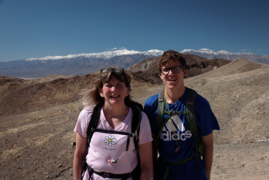Lara and Alex looknig over Death Valley from the top of Desloati